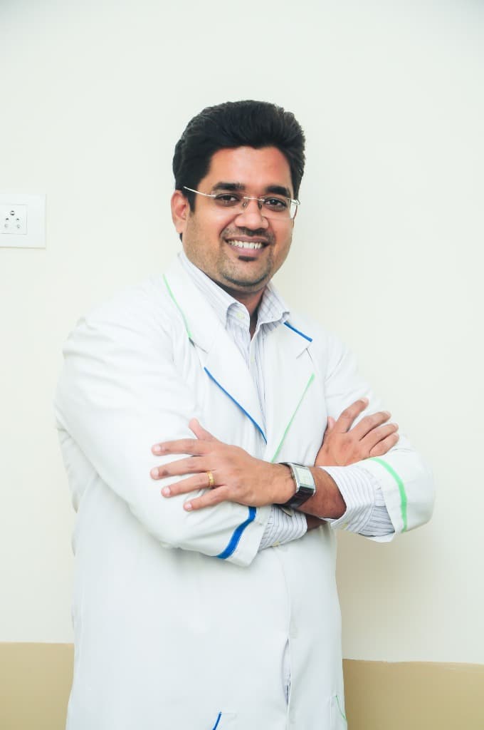 Dr. John Madugula